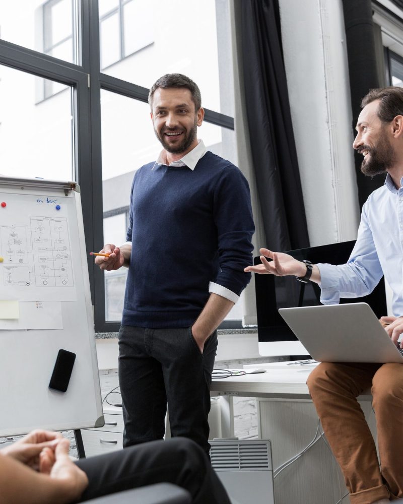 business-coworkers-discussing-new-ideas-scaled